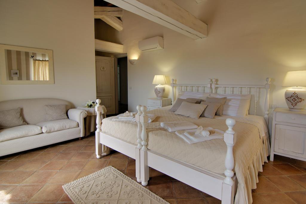 Domus Corallia-Luxury Rooms Porto Rotondo Szoba fotó