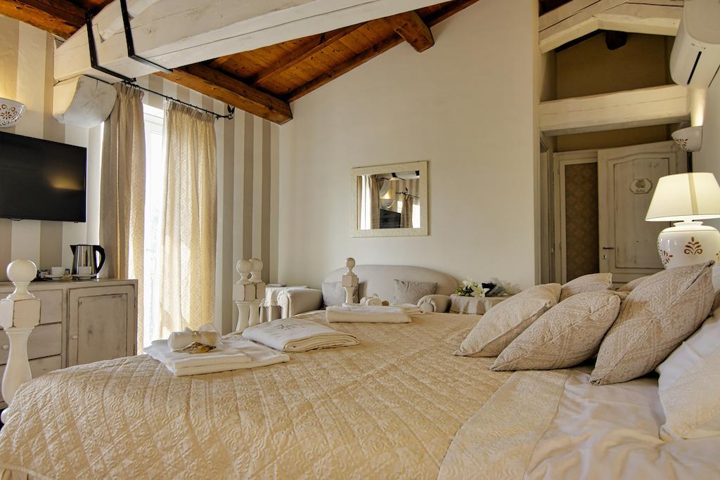 Domus Corallia-Luxury Rooms Porto Rotondo Szoba fotó